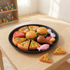 18-Piece Pretend Food Play Set featuring colorful toy pizza, burgers, and more arranged on a black plate.