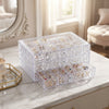 3-Layer Clear Acrylic Jewelry Organizer Box with neatly arranged jewelry displayed on a marble surface.
