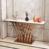 Marble Top Gold Console Table showcasing elegant design with unique base and decorative items.