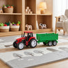 Plastic Farm Tractor Toy with Detachable Green Trailer on a play mat in a cozy room setting.