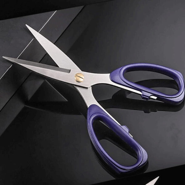 Stainless Steel Multi-Purpose Tailor Shears on a sleek surface, ideal for fabric and heavy paper cutting.