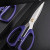 Stainless Steel Multi-Purpose Tailor Shears with ergonomic purple handles and sharp blades for precision cutting.