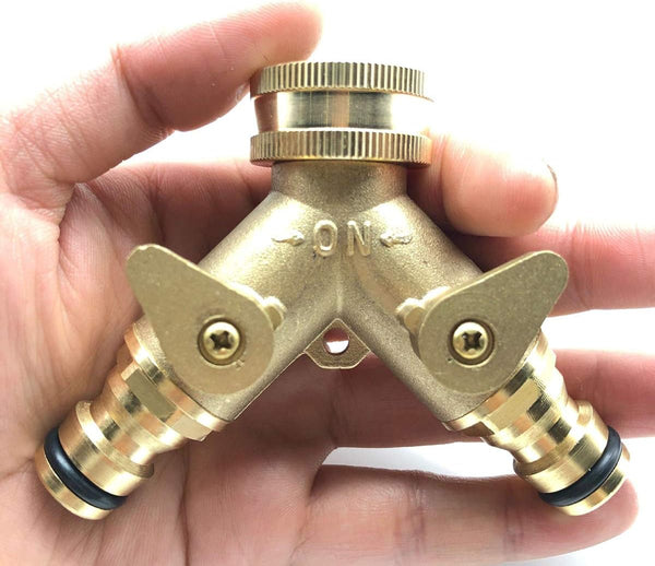 Brass 2-Way Garden Hose Splitter with Stop Valves held in hand, showcasing dual outlets and stop valves.