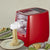 13 in 1 Pasta Maker producing spaghetti noodles with colorful pasta shapes on plates.