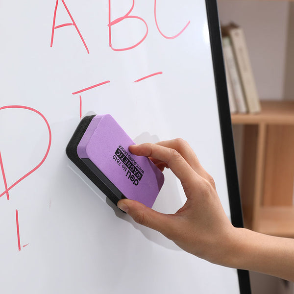 A hand using a Magnetic Whiteboard Eraser to clean a whiteboard surface.