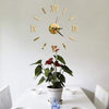 3D DIY Mirror Golden Surface Wall Clock Roman Numeral above a potted plant on a dining table.