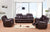 Lux Comfort Reclining Sofa in a modern living room setting with a stylish lamp and large windows.