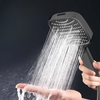 360 Degree Adjustable High-Pressure Shower Head delivering strong water flow in a hand.