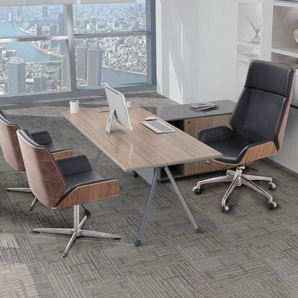 Ergonomic High Back Leather Gaming Chair in modern office setting with wood desk and stylish chairs.