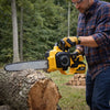 Cordless Telescopic Chainsaw 13 Inch Bar Tool-Free Tension in use cutting wood in a forest setting.