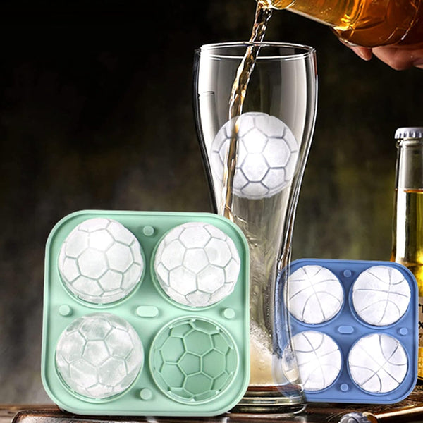 Sports Ice Ball Molds in football and basketball shapes filling a glass with beverage.