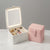 Portable Cosmetic Organizer with LED Mirror displaying makeup products and illuminated mirror.