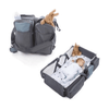2 in 1 Travel Baby Bed & Bag featuring a portable baby bed and spacious carry bag with stuffed animals.