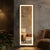 Full Length LED Backlit Wall Mounted Mirror illuminating a stylish living space with modern decor.