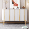 Modern Luxury Sideboard Table featuring a marble-effect top, fluted doors, and gold accents in an elegant living space.