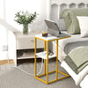 C Shaped Side Table with Charging Station next to a bed, featuring a tablet and coffee, designed for convenience.