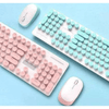 2.4 G Wireless Keyboard & Mouse Set featuring ergonomic retro design in pink and teal colors.