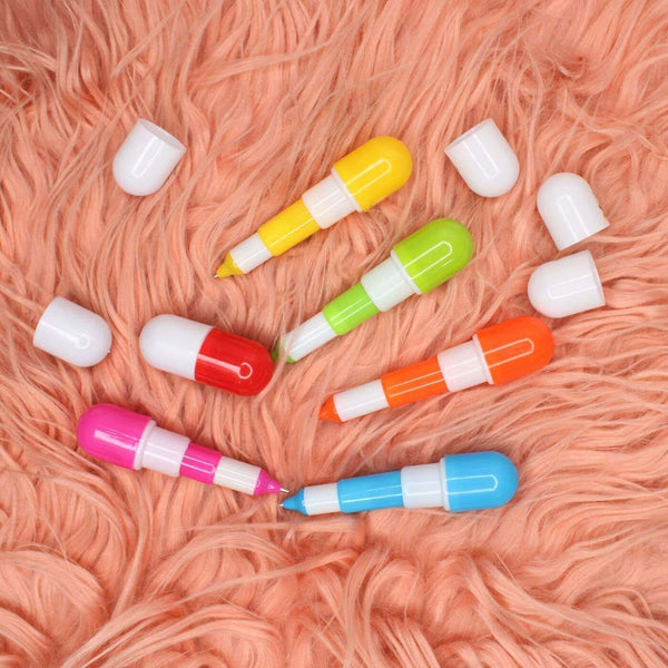 Colorful Capsule-Shaped Writing Pen collection on a fluffy background, showcasing playful design for writing.