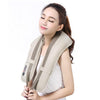 Cervical Massage Shawl being used by a woman relaxing with a smile, promoting neck and shoulder relief.