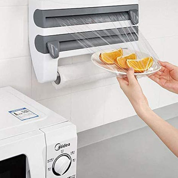 4 In 1 Wall Mounted Paper Towel Foil Wrap Dispenser in use, wrapping food with cling film and paper towels.