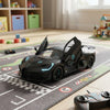 Black Racer Remote Control Toy Car with functional opening doors on a colorful playmat.
