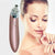 Acne Pore Vacuum Cleaner Blackhead Remover displayed next to a woman with clear skin and a gentle smile.