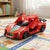 A vibrant Speed Spark Battery-Powered Toy Car with wings open, designed for imaginative play, displayed on a colorful play mat.