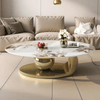 Heritage Marble Coffee Table featuring a polished marble top and gold base in a modern living room setting.