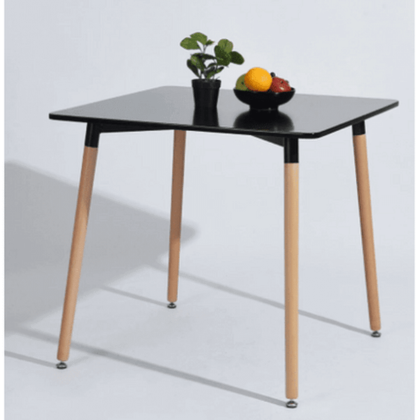 Compact Square Dining Table showcasing modern design with black top and wooden legs, perfect for small spaces.