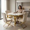 Modern 4-Seater Luxury Round Dining Table Set with elegant marble top and gold accents, featuring stylish cream chairs.
