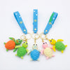 Colorful 3D Rubber Sea Turtle Keychain with multiple vibrant turtle designs and blue straps.