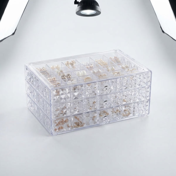 3-Layer Clear Acrylic Jewelry Organizer Box displaying neatly arranged jewelry in a transparent storage unit.