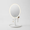 Oval LED Makeup Mirror with integrated lighting, perfect for vanity or dressing area.