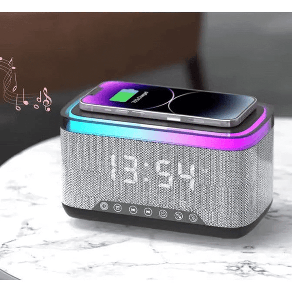 Smart Multifunction Alarm Clock with Bluetooth Speaker with wireless charging and colorful display on bedside table.