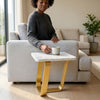 Wooden Coffee Table with Cross Frame Metal Legs beside a sofa, styled with a cup of coffee.