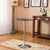 Round Bistro Bar Table with Adjustable Height in a stylish living room setting.