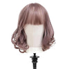 Wood Mannequin Head Wig Display Stand showcasing a stylish wavy wig in light purple color.