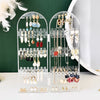 Capacity Plastic Folding Jewelry Holder displaying earrings and necklaces in an organized manner.