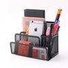 Classic Standing Desktop File & Magazine Organiser Rack holding pens, notebooks, and a phone in a stylish desk organizer.