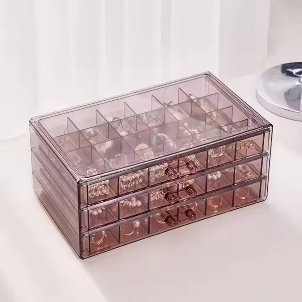 Clear Acrylic 3-Drawer 72-Compartment Jewellery Box filled with assorted jewellery for organized storage.