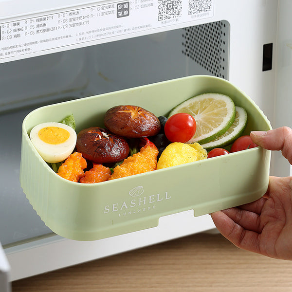 Collapsible Double-Layer Lunch Box with colorful vegetables and egg, perfect for convenient and organized meals.
