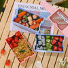 Double-Layer 1200 ml Plastic Lunch Box with Spoon featuring stacked compartments filled with food.