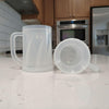 Double Layer Reusable Drink Mug on a kitchen counter, showcasing its double-layer design for insulation.