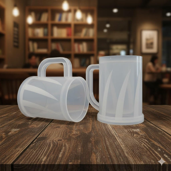 Double Layer Reusable Drink Mug on a wooden table in a cozy cafe setting, showcasing two mugs with stylish designs.