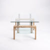 Modern Double Tier Glass Coffee Table with clear tempered glass and a wooden base.