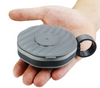 Foldable silicone travel cup in a hand, showcasing its compact design and portability for travel and outdoor use.