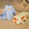Fun Cartoon 500 ml Kids Water Bottle in light blue and yellow bus design, perfect for kids' hydration on-the-go.