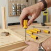 Using the 6 Piece Multi Tip Precision Screwdriver for furniture assembly and household repairs.