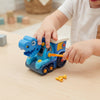 Child playing with Dino Vehicle Construction Toy, a blue dinosaur-themed construction vehicle with tools.