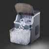 Portable Countertop Ice Maker with ice cubes overflowing from bin, showcasing its efficient ice-making capabilities.